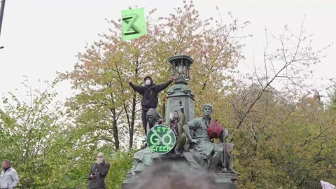 'Let's Go Green' - Extinction Rebellion protesting at Youth March during COP26 Stock Footage 167012912