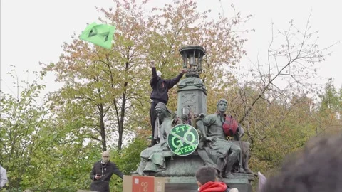 'Let's Go Green' - Extinction Rebellion protesting at Youth March during COP26 Stock Footage 167012915