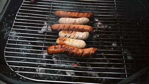 Let's grill some sauages Stock Footage 99017184