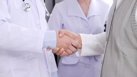 Let's shake hands doc. Stock Footage 107854895