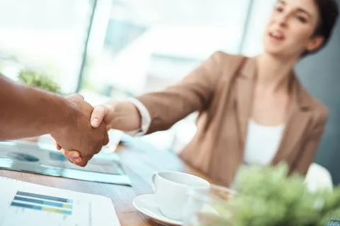 Lets shift business to the forefront together. two businesspeople shaking hands Stock Photos