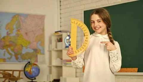 Lets study together. Learning to use protractor. back to school. High school Foto stock