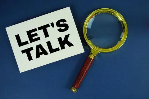 Let's Talk text written on paper with magnifying glass Stock Photos
