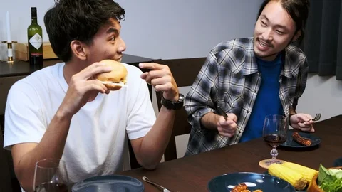 Let's try that burger. Stock Footage 99017130