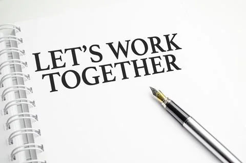Let's work together words on white notepad and pen Stock Photos