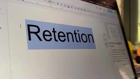 Letter black text appear on computer screen typing word "Retention" Stock Footage 249807857