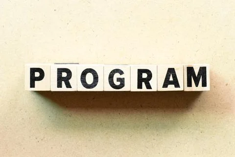 Letter block in word program on wood background Stock Photos