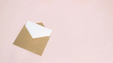 Letter brown craft envelope layout of sheet isolated on a pink background mocap Stock Photos