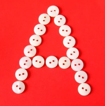 Letter "a" from buttons on a red background Stock Illustration