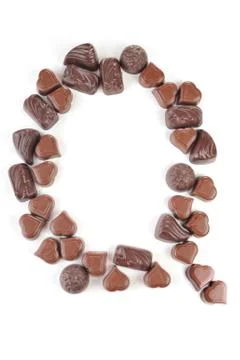 Letter from chocolates Stock Photos