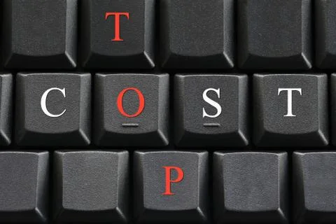 The letter of Cost and Top on computer keyboard background. Stock Photos