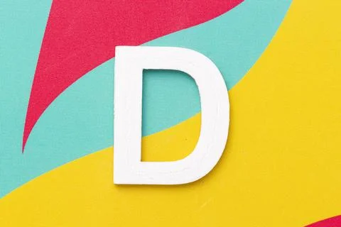 Letter D of the alphabet on colored background, top view Stock Illustration