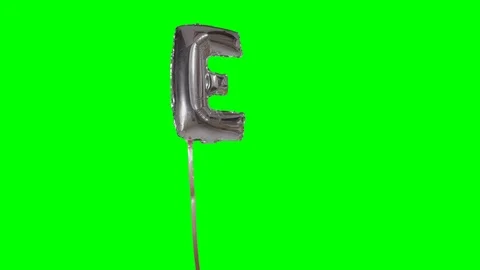 Letter E from alphabet helium silver balloon floating on green screen Stock Footage 103243723