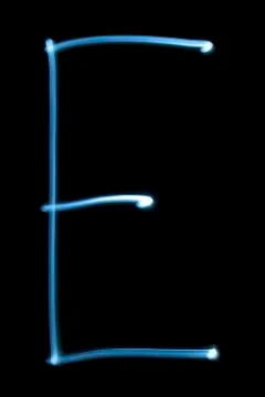 The letter e from neon light. Stock Photos