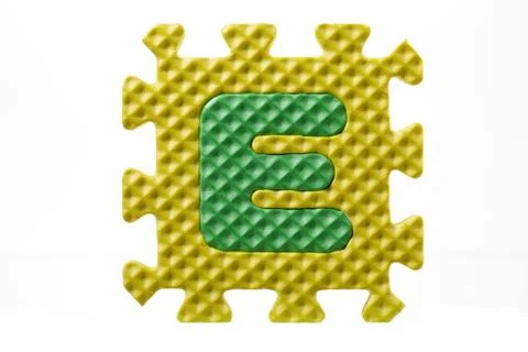 Letter e on a rubber puzzle Stock Photos