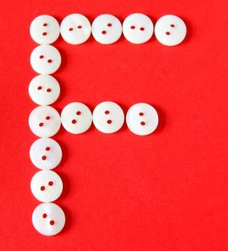 Letter "f" from buttons on a red background 库存插图