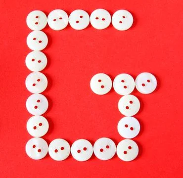 Letter "g" from buttons on a red background 库存插图