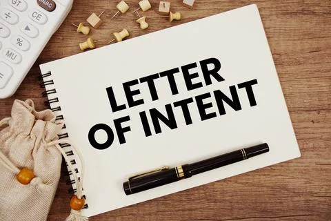Letter Of Intent text written on notepad with pen and calculator on wooden .. Stock Photos