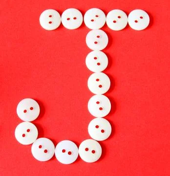 Letter "j" from buttons on a red background 库存插图