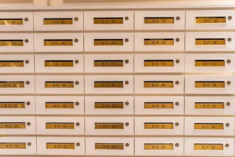 Letter mailbox array at postal room in high-end condominium building Foto stock