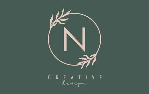Letter N Logo with circle frame and pastel leaves design. Rounded vector illu Stock Illustration