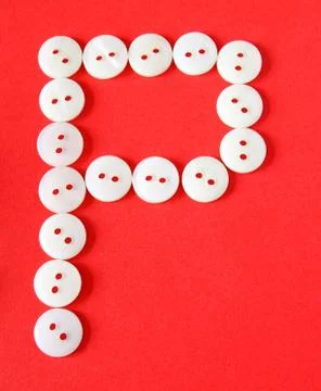 Letter "p" from buttons on a red background Stock Illustration