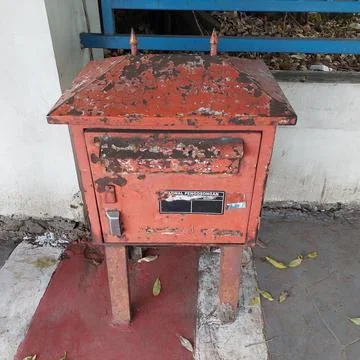 Letter post box provided on the side of the road Stock Photos