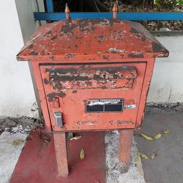 Letter post box provided on the side of the road Stock Photos