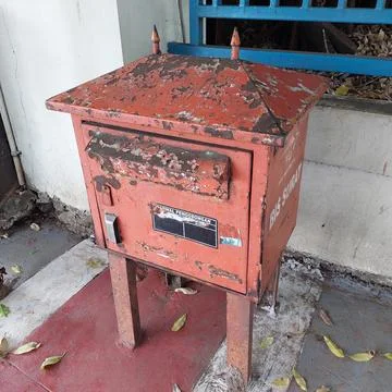 Letter post box provided on the side of the road Stock Photos
