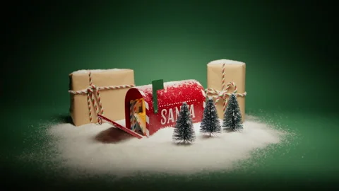 Letter to Santa in open red mailbox with gifts and Christmas decor under snow 4K Stock Footage 255315320