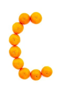 Letter solved with tangerines Stock Photos