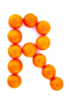 Letter solved with tangerines Stock Photos