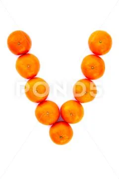 Letter solved with tangerines Stock Photos