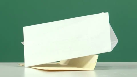 A letter standing on the table and elegant, Chroma Key Vídeos de archivo 344586429