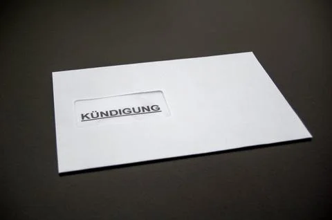 Letter of termination in an envelope Stock Photos