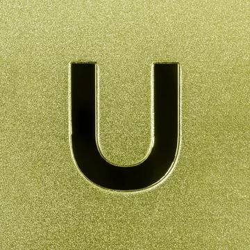 Letter U on a silver grained shiny metal surface. English alphabet. Stock Photos