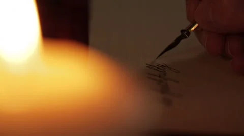 Letter writing in defocused candlelight Video stock 64632955