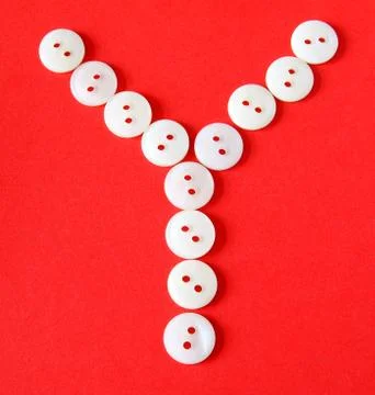 Letter "y" from buttons on a red background 库存插图