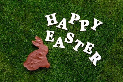 Lettering Happy Easter, laid out on the grass. Stock Photos