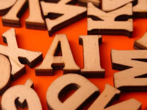 The letters AI in the image are made ofwooden blocksand represent the abbre.. Stock Photos