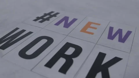 Letters on concrete background saying "#newwork". New work concepts. Video stock 228875700