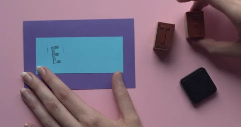 Letters EFT written on paper with rubber stamps. Stock Footage 308747794