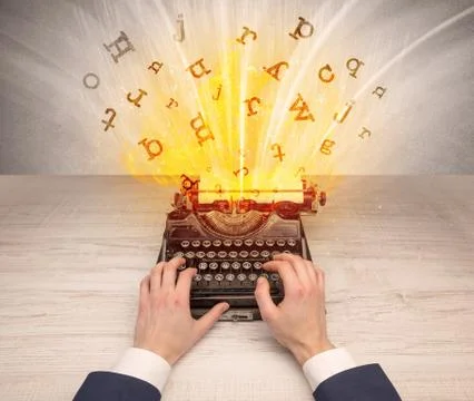 Letters exploding from a vintage typewriter Stock Photos