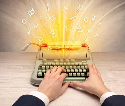 Letters exploding from a vintage typewriter Foto stock