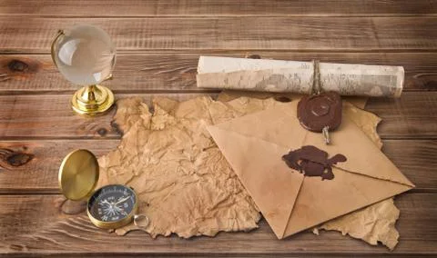 Letters, map, compass and globe Stock Photos