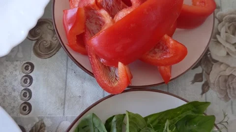 Lettuce and red pepper on the table. Stock Footage 203219543