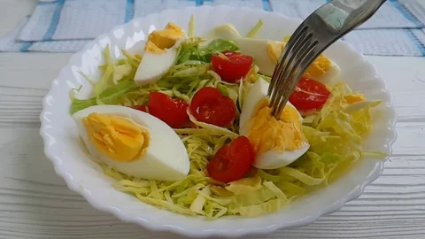 Lettuce egg cabbage tomato fork Video stock 89765748