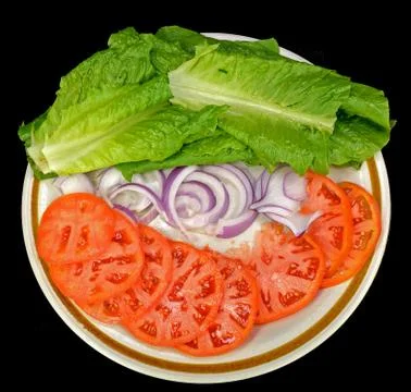 Lettuce tomato and onion Stock Photos