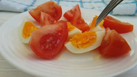 Lettuce tomato egg fork Stock Footage 87608292