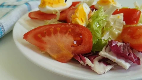 Lettuce tomato egg fork, healthy food, organic Video stock 87659502
